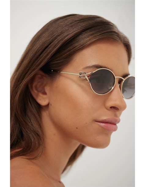 miu miu oval metal sunglasses|miu oversized sunglasses.